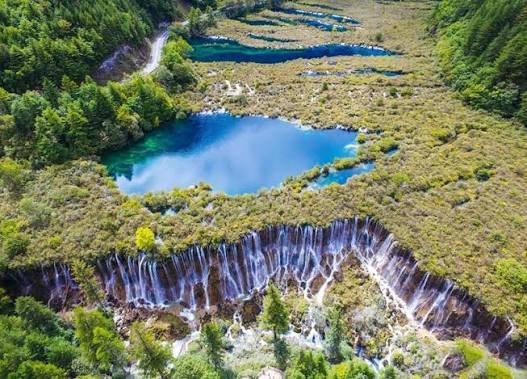 Cascading water at Nuorilang Waterfall in Jiuzhaigou